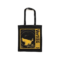 a black and yellow tote bag with the words vertigo on it